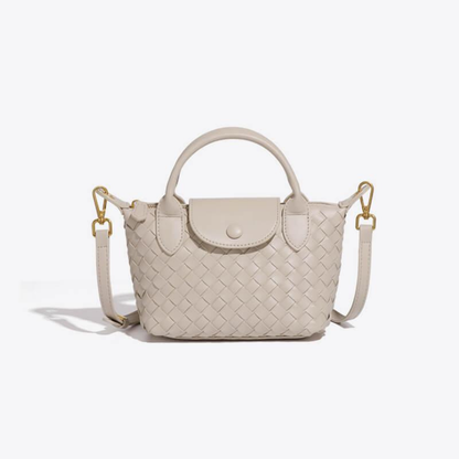 Kompaktowa torebka z plecionym wzorem – elegancja w mini formacie