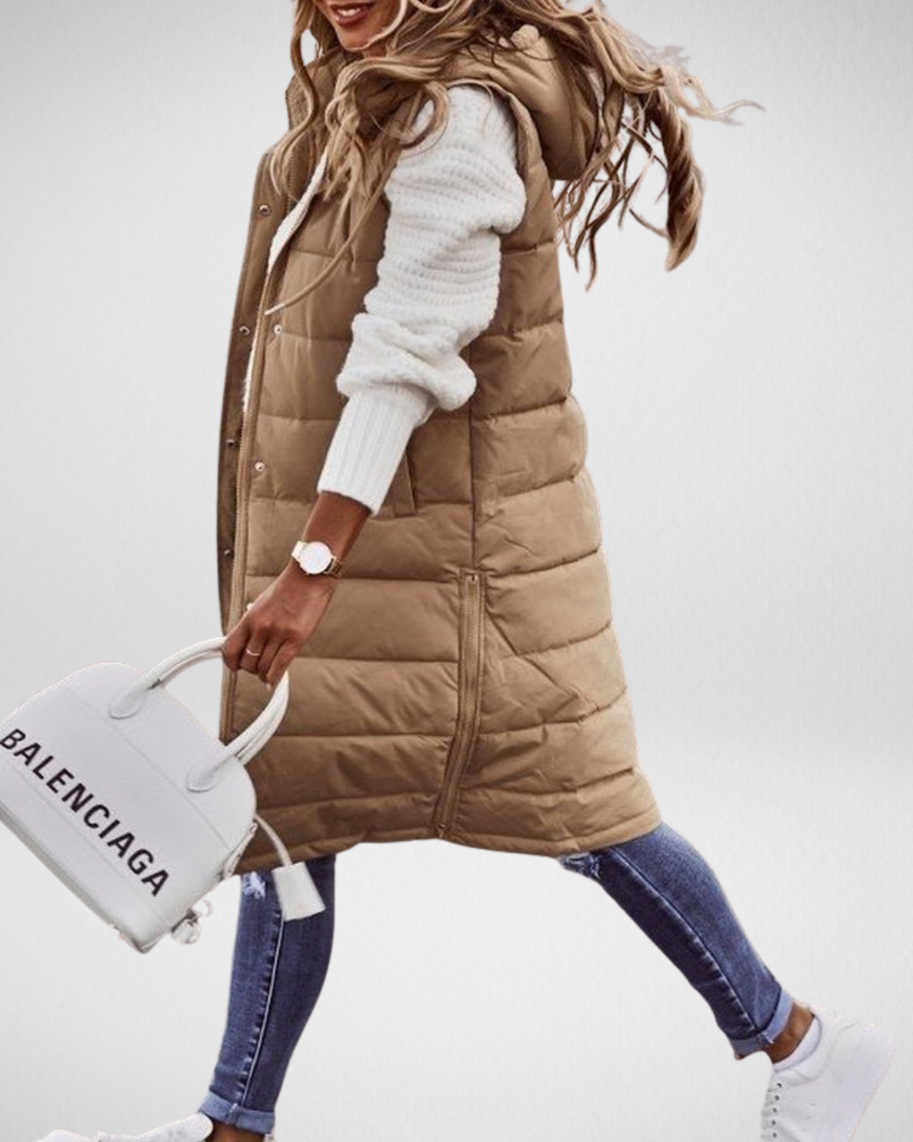 Damska pikowana kamizelka z kapturem – elegancja i komfort na chłodniejsze dni