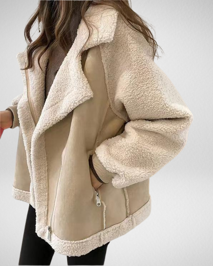 Kurtka damska z kożuszkiem – ciepło, styl i wygoda