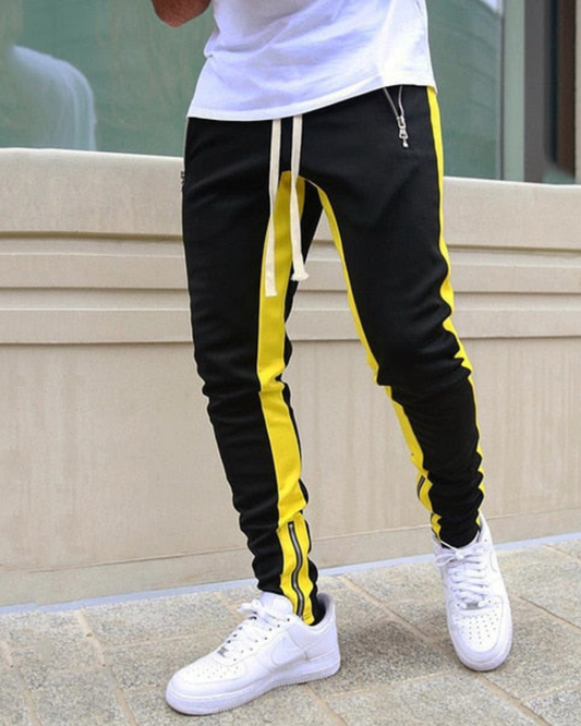 Męskie spodnie dresowe z kontrastowymi paskami – komfort i sportowy styl